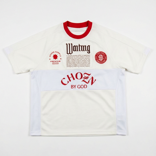 White t-shirt with red and black text and graphics on a white background